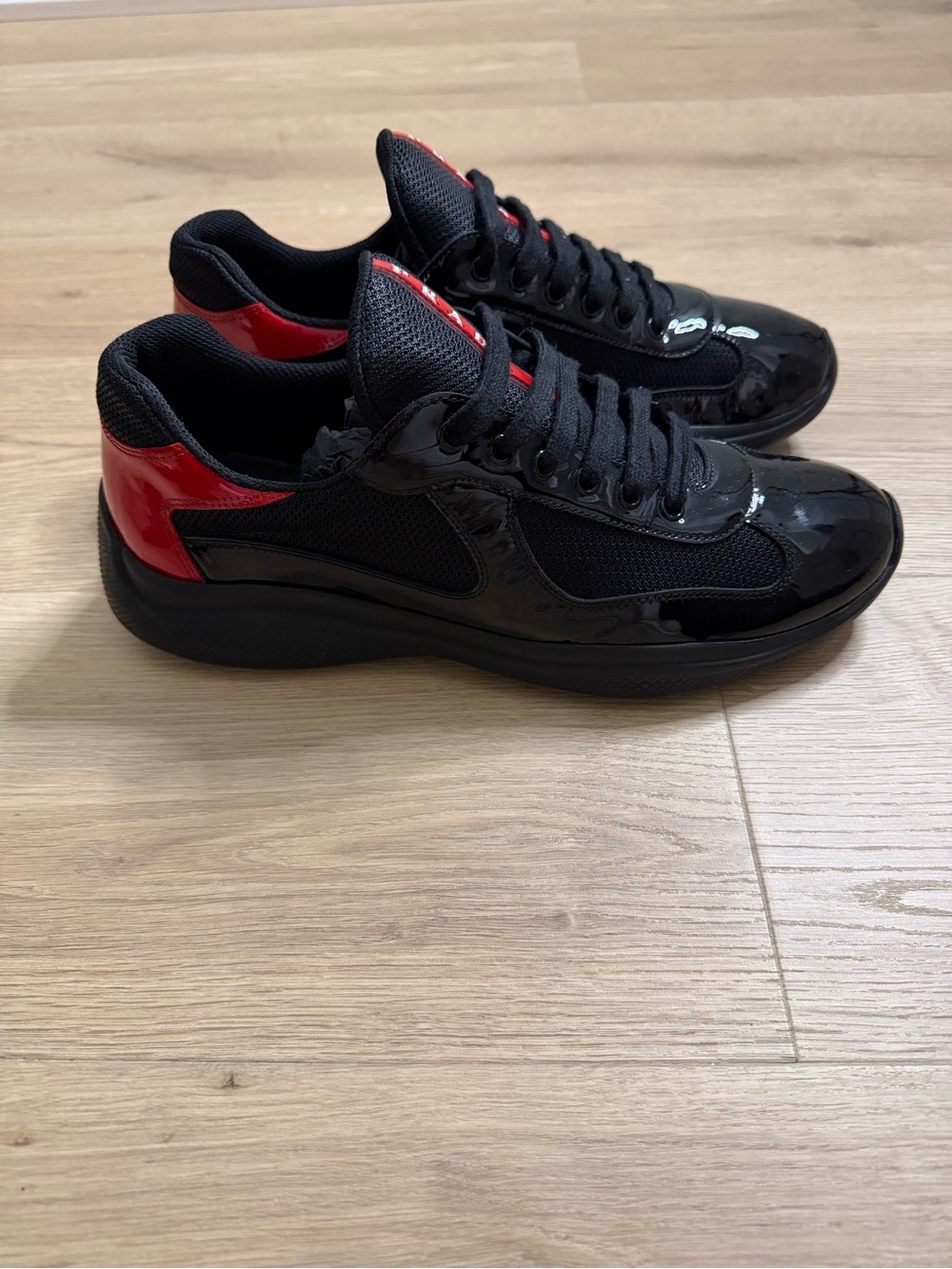 Prada Black Sneakers with Red Logo Stripe - Picture 2 of 4